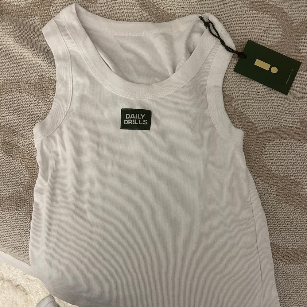 Daily drills logo tank